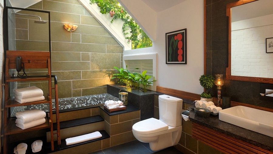 Modern bathroom with towels and a skylight-Amanvana Spa Resort, Coorg - Luxury Resort