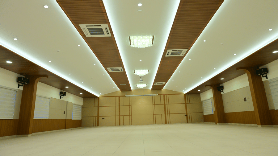 Banquet hall of Bhavanis Vista By Icon featuring an empty floor and ceiling lighting.