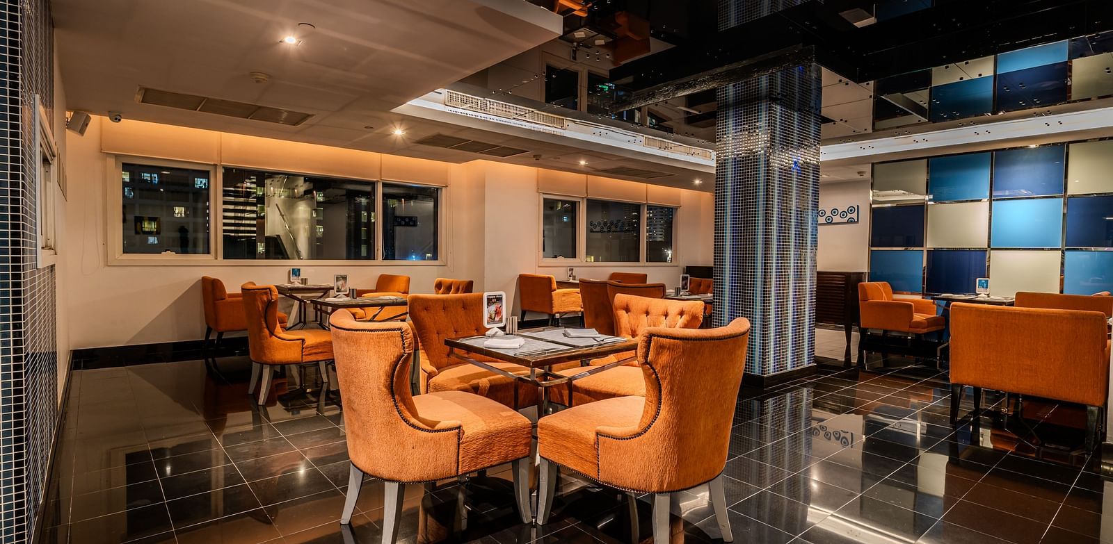 An overview of the seating arrangements inside flava restaurant - Night Hotel Bangkok
