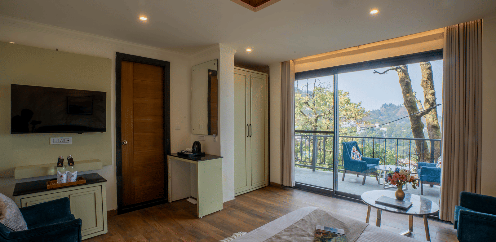 The Super Deluxe Room With Shared Balcony & Valley View featuring the common balcony at Perfectstayz Premium Westend Mall Road, Mussoorie, overlooking the valley views.