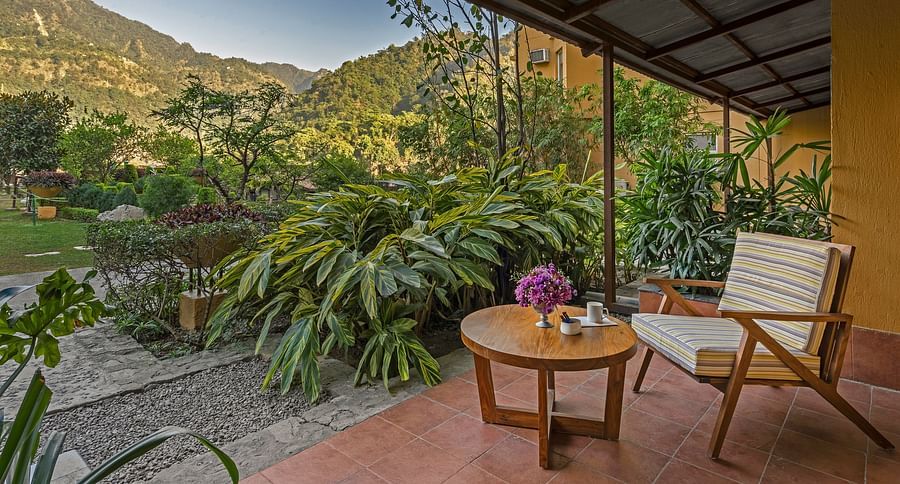 The outdoor sitting area of the superior royal room in Rishikesh - Aloha on the Ganges Rishikesh