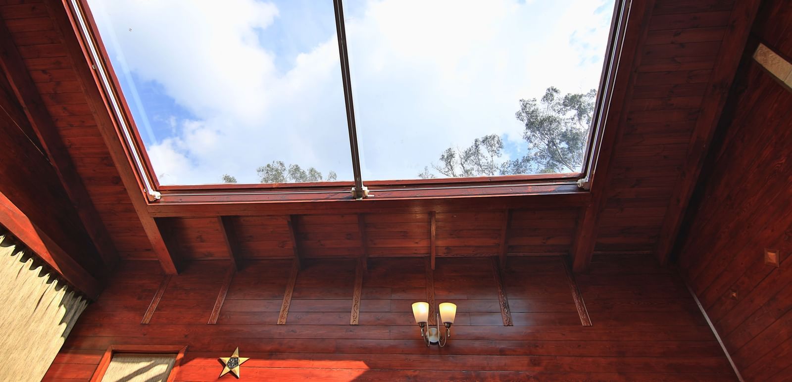 The glass window in our villa letting the sun rays into the room - Accord Highland Ooty