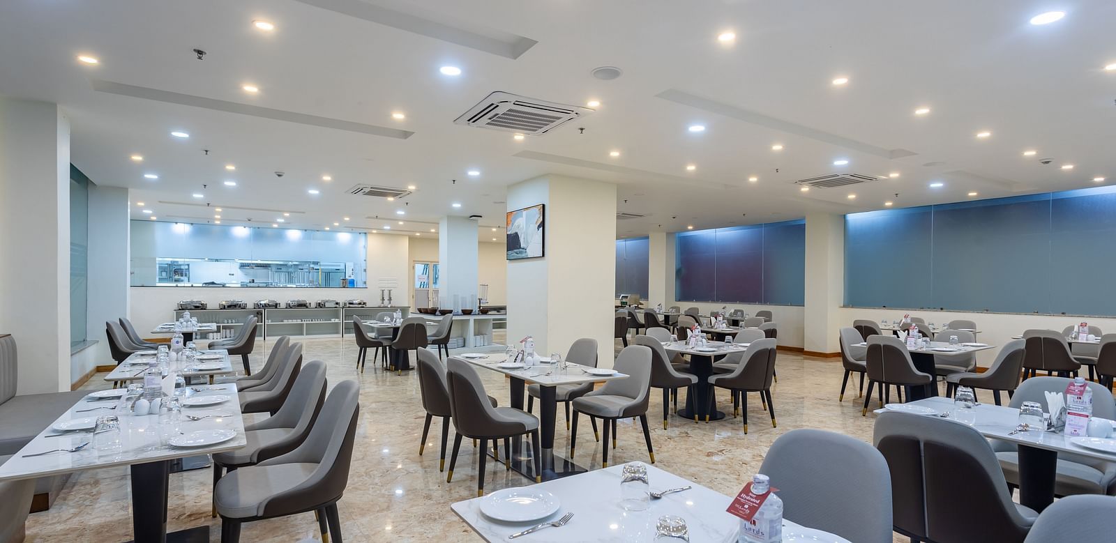 Close up view of dining tables placed spaciously at the Blue Coriander Restaurant at Mandala Norling Lords Prime in Kathmandu.
