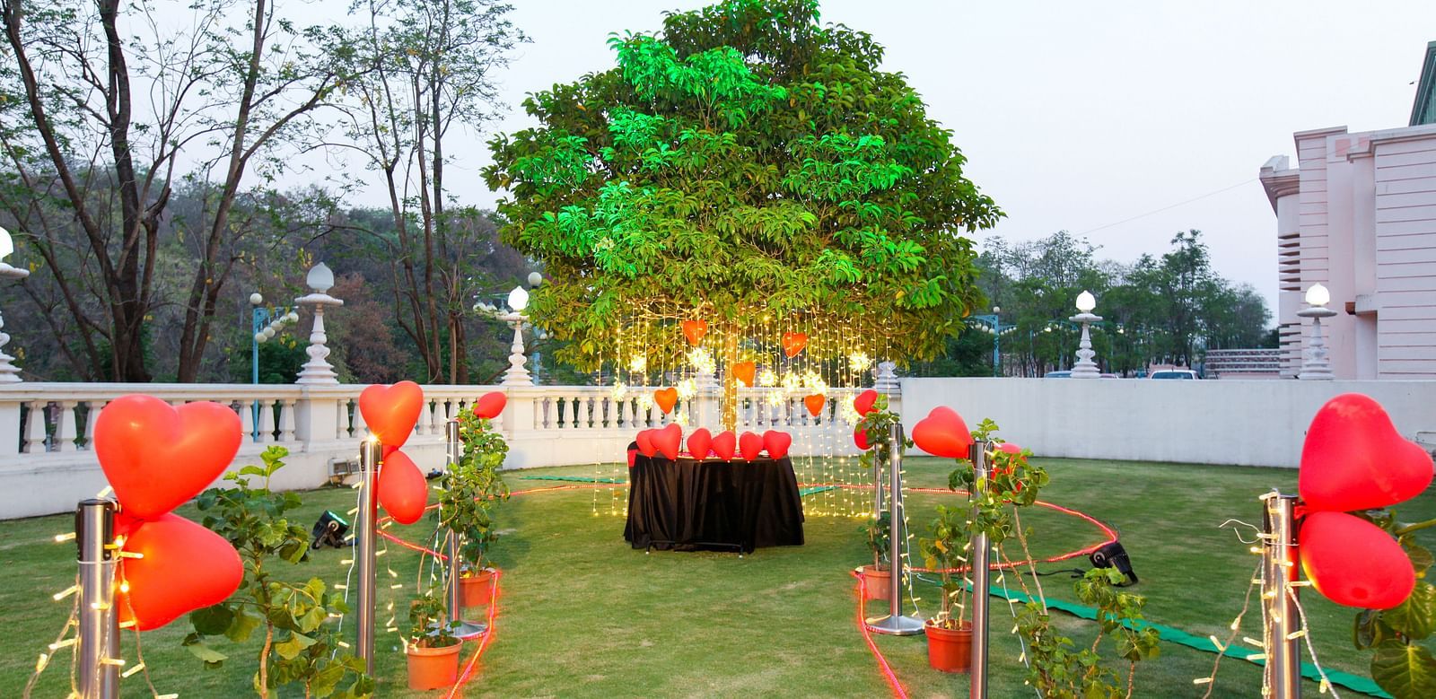 a lawn decorated in a valentine theme during daytime at Ramoji Film City Hotels in Hyderabad 
