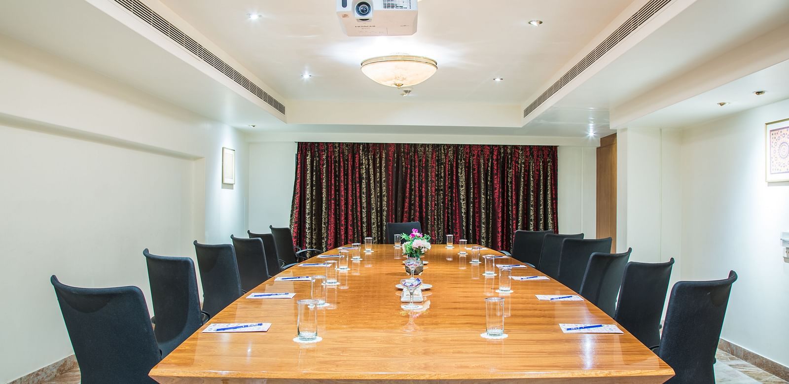 Well lit boardroom at SItara Luxury Hotel in Hyderabad near Ramoji Film City