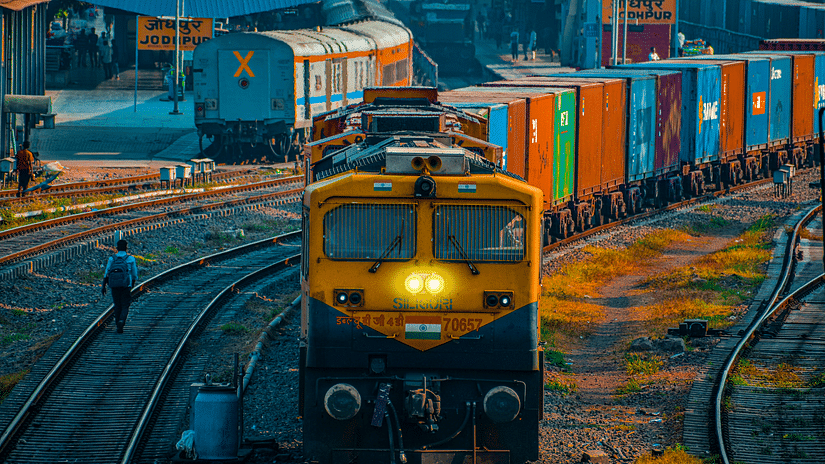 Train traveling through a city.