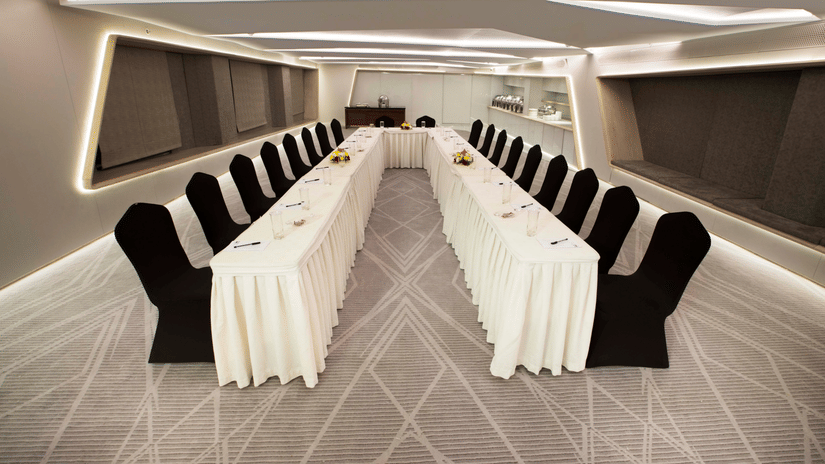 Contemporary boardroom setup with conference seating and presentation facilities for corporate meetings and workshops | Hablis Hotel Chennai
