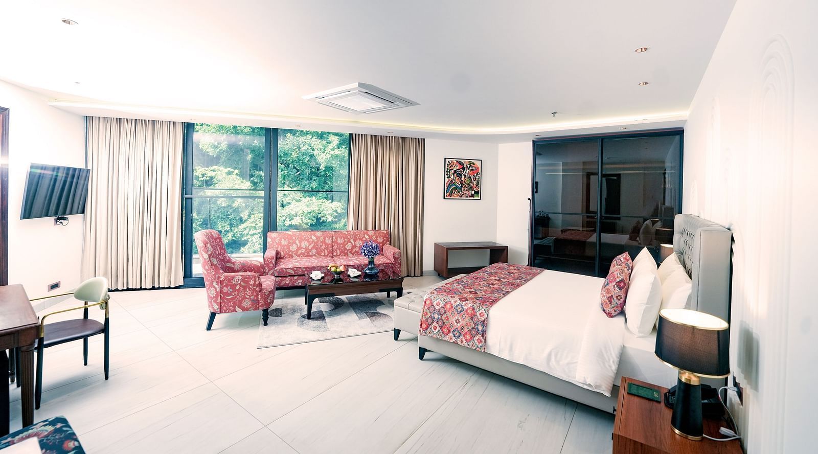 A suite with a floor-to-ceiling windows, cosy furniture and a queen size bed - NAMAMI BY ZENQ BANKHANDI