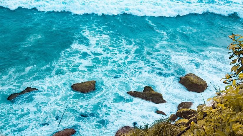 waves crashing on rocks