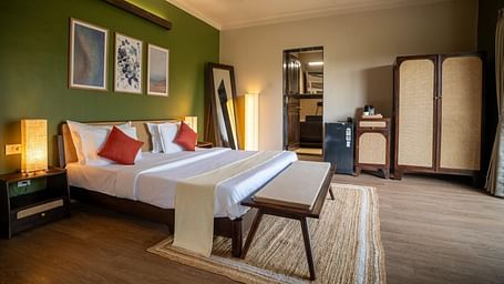 Bright bedroom with earthy tones and sleek furniture at Kssemya.
