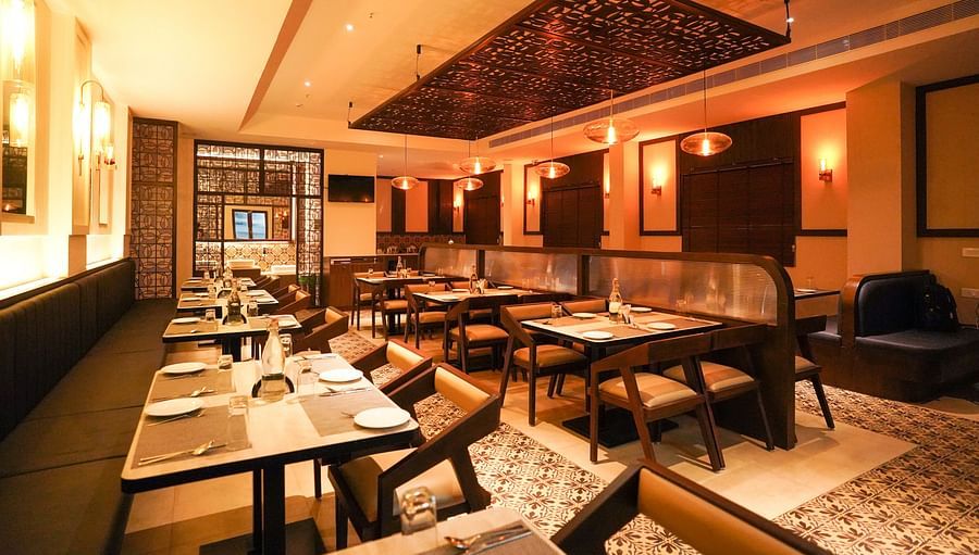 V Five Hotel - warmly lit up restaurant - Fifth sense