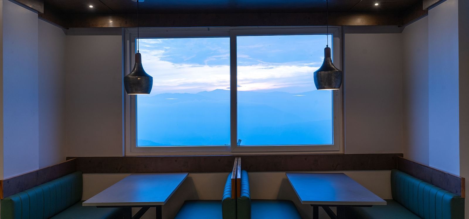 image of the restaurant with amazing mountain view at The Soma by Avianna Group, Darjeeling