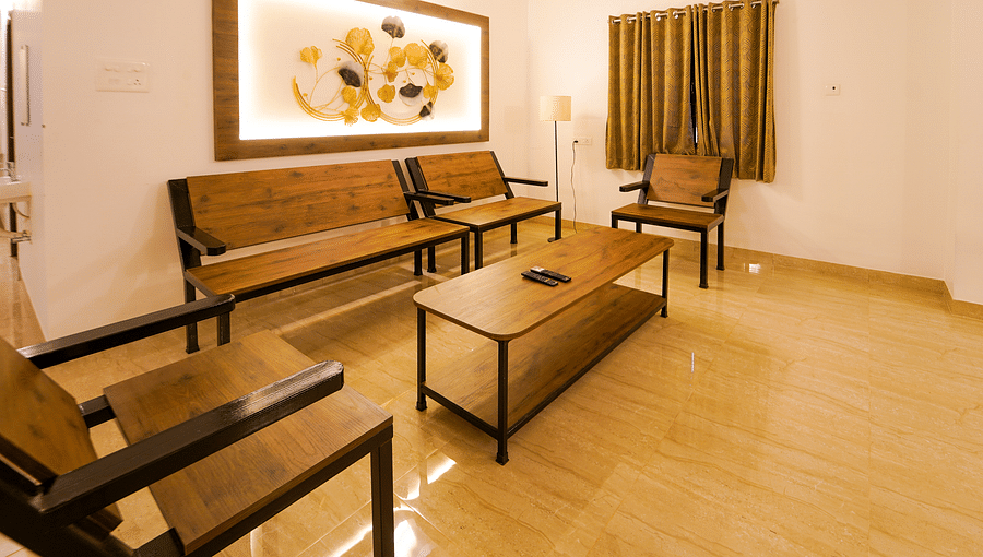 alt-text Close up shot of the seating arrangements in the living area inside Superior Villa - La Tamara Luxury, Pondicherry