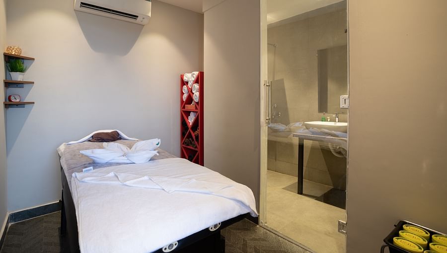 image of the spa featuring an air conditioned room with a wide bed at sibaya beach resort, morjim beach