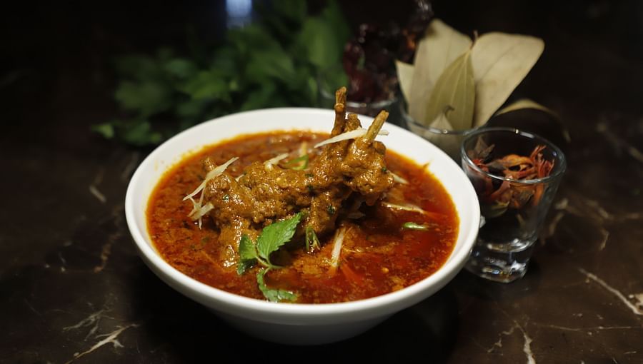 Udman By Ferns N Petals, Chattarpur -  mutton rogan josh dish plated on a table
