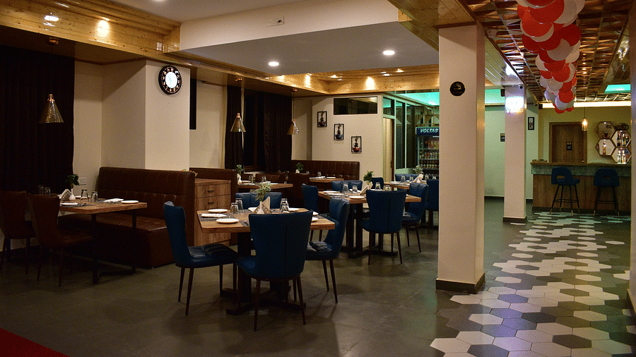 Hotel Montana Vyoo, Namchi Sikkim dining area with attractive interior and indoor seating arrangement decorated with red and white balloons at Hotel Montana Vyoo1