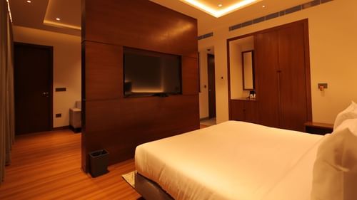 view of the king size bed of Suite at Pride Elite, Haridwar