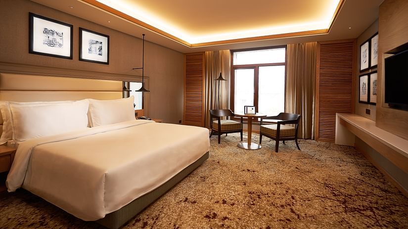 Premium Rooms bed and balcony view