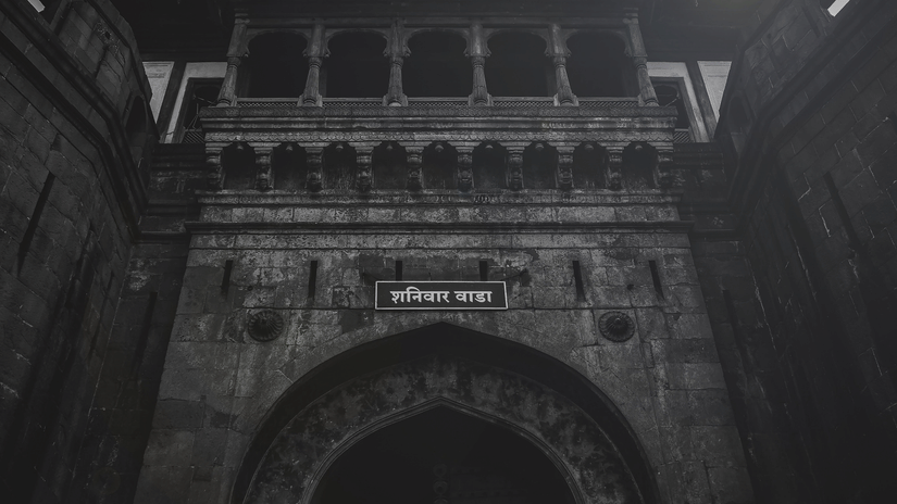 The imposing main entrance of Shaniwar Wada displaying the historic fort gateway.
