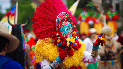 People dressed up in festive attire during a festival celebration in Goa