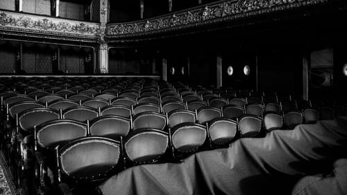 Image of chairs arranged in a theatre 