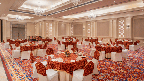 tables and chairs set up in a cluster arrangement in our event venue in jalandhar - Park Plaza, Jalandhar