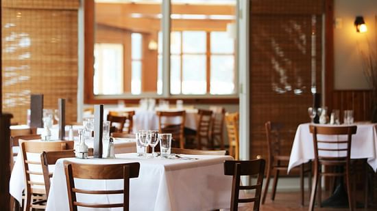 A dining space featuring cosy seating and a welcoming, warm atmosphere