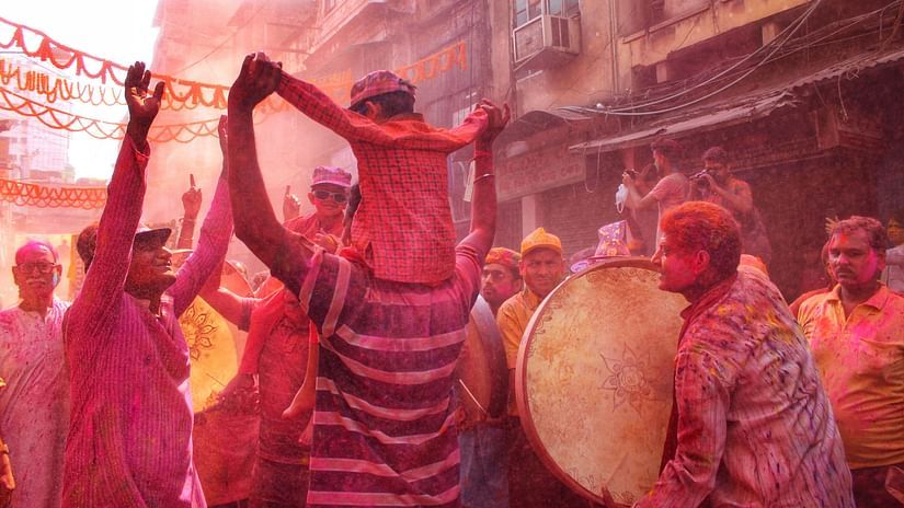 Holi celebration on the street with drums