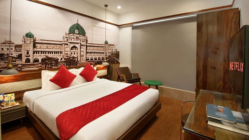 2 bedroom suite with an expansive window overlooking the city in khar