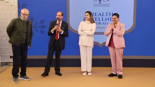 An image of four people sharing a stage together at Heritage Village Resorts & Spa