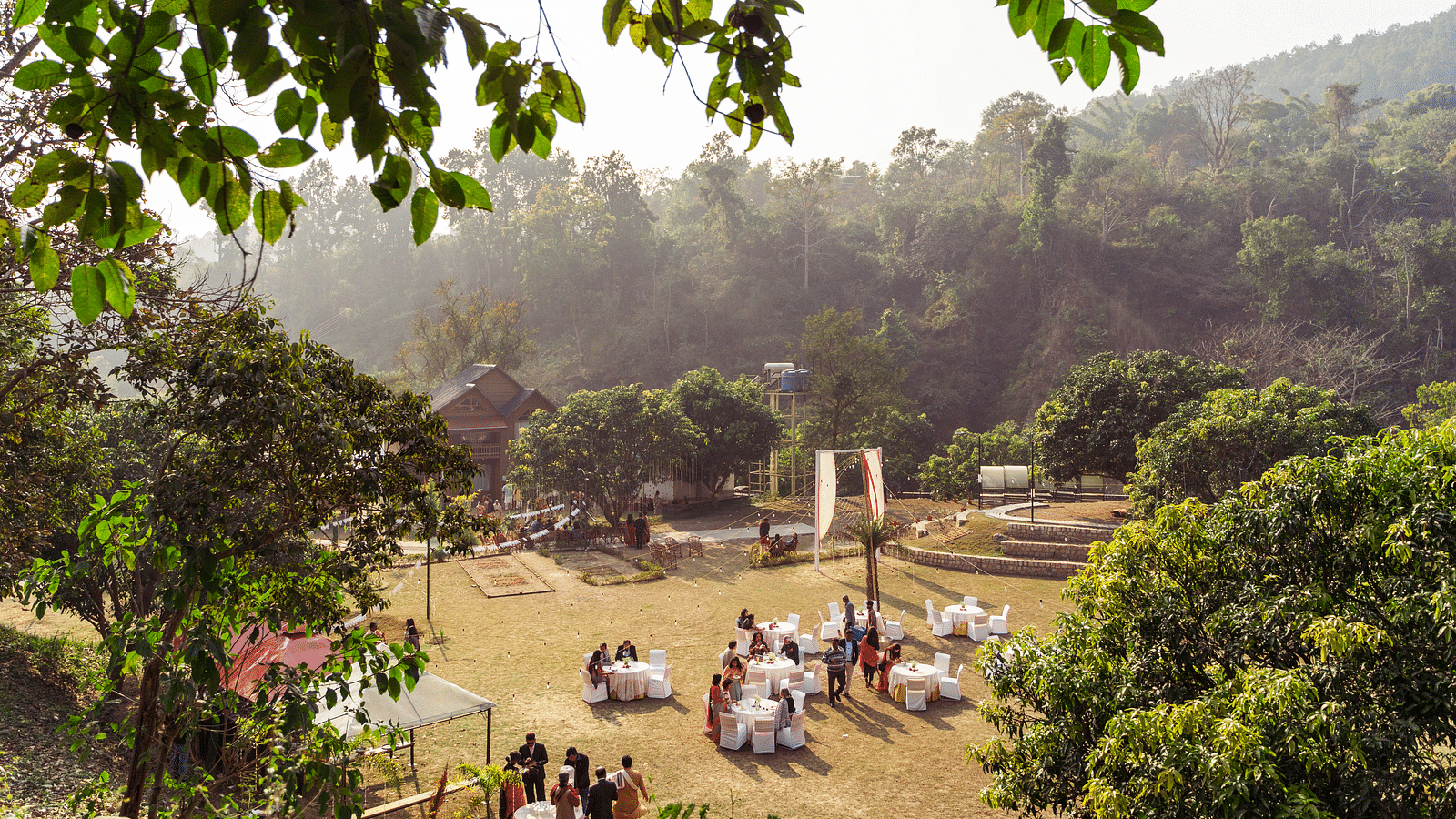 An aerial view of a wedding setup in the lawn at The Sylvan Retreat, Dehradun.