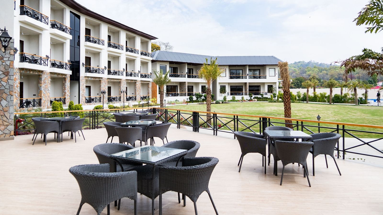 A outdoor seating arrangement of our restaurant- Shervani Pebbles & Pines, Corbett