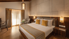 The Ocean View King Room looks neat and serene in natural lighting