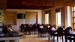 Restaurant with comfortable wooden chairs