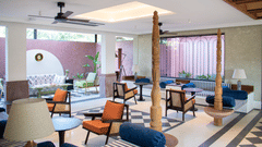 Side view of The Sierra's outdoor seating area beneath the roof