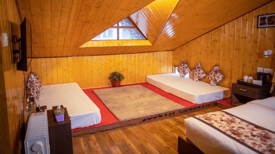 Dream Villa Retreat, Pelling - The sofas kept on the floor of the Attic room making it a sitting area
