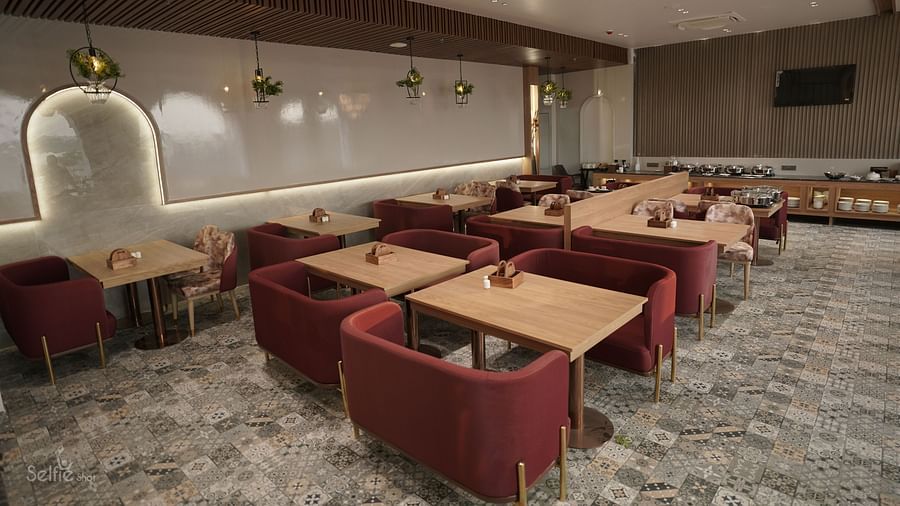 Well lit dining Area at Pride Comfort, Dwarka