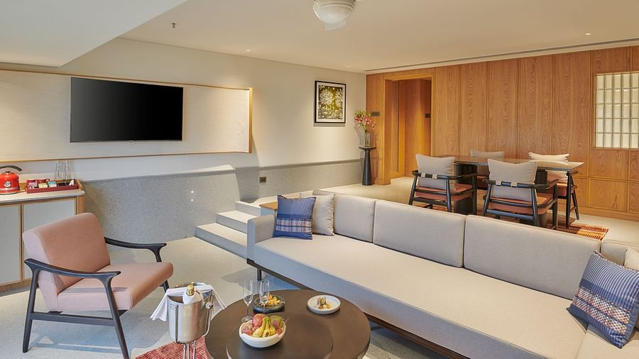 Image of a sitting area with a sofa and coffee table in front of it at The Dukes Retreat.