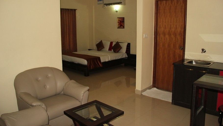 Hotel Arama Suites Bangalore living   bedroom area terra suite 1 hotel arama suites bangalore
