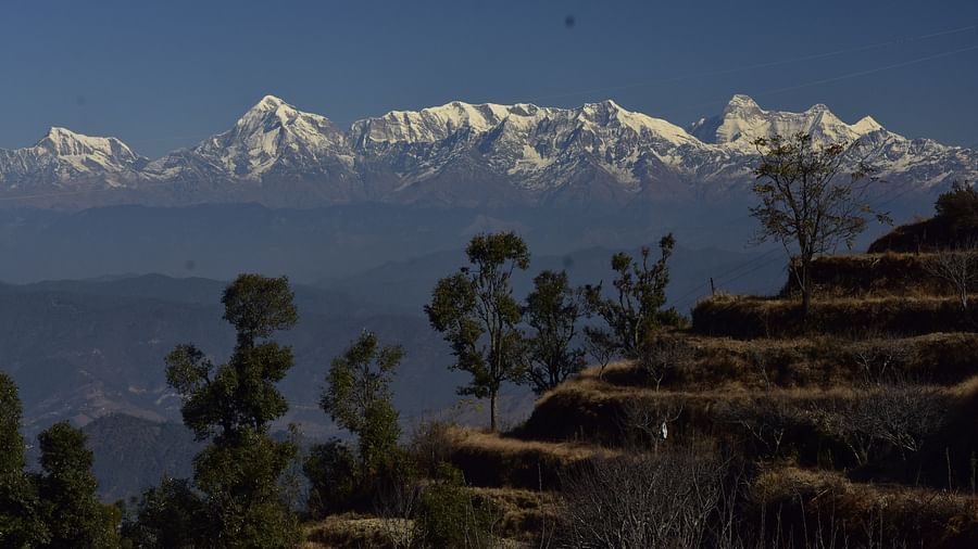 A farm at our resort in Almora with snow-capped Himalayas in the background - BluSalzz Escapade - Anant Rasa Resort