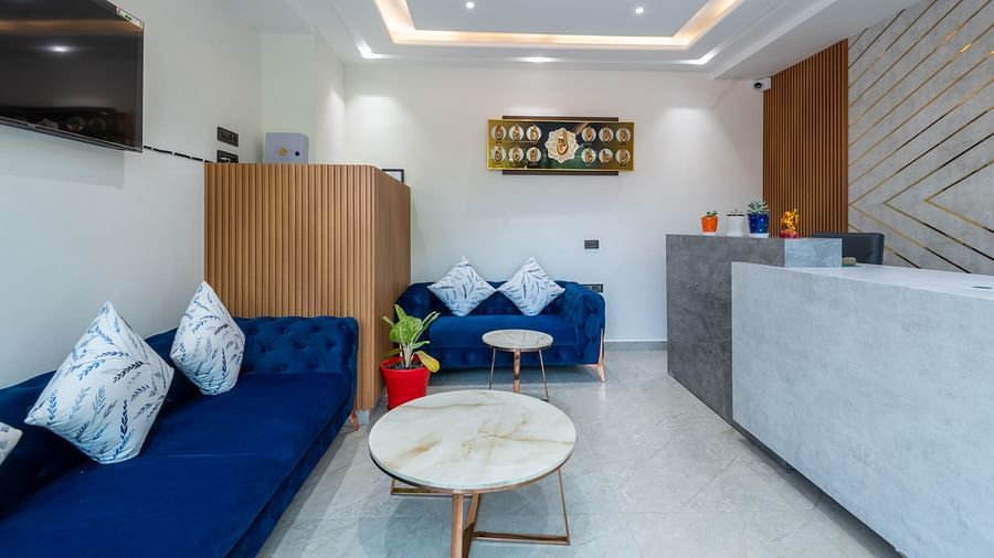A front shot of the reception area showcasing the waiting area and the reception desk - DLS The Emerald, Nainital