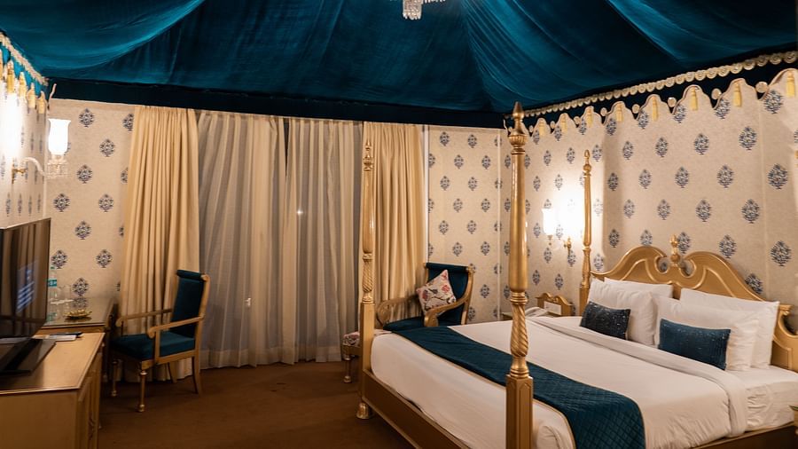 Image of a room and a television in front at Rajasthali Resort & Spa Jaipur.
