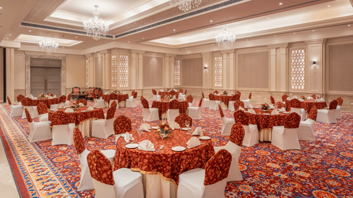 tables and chairs set up in a cluster arrangement in our event venue in jalandhar - Park Plaza, Jalandhar