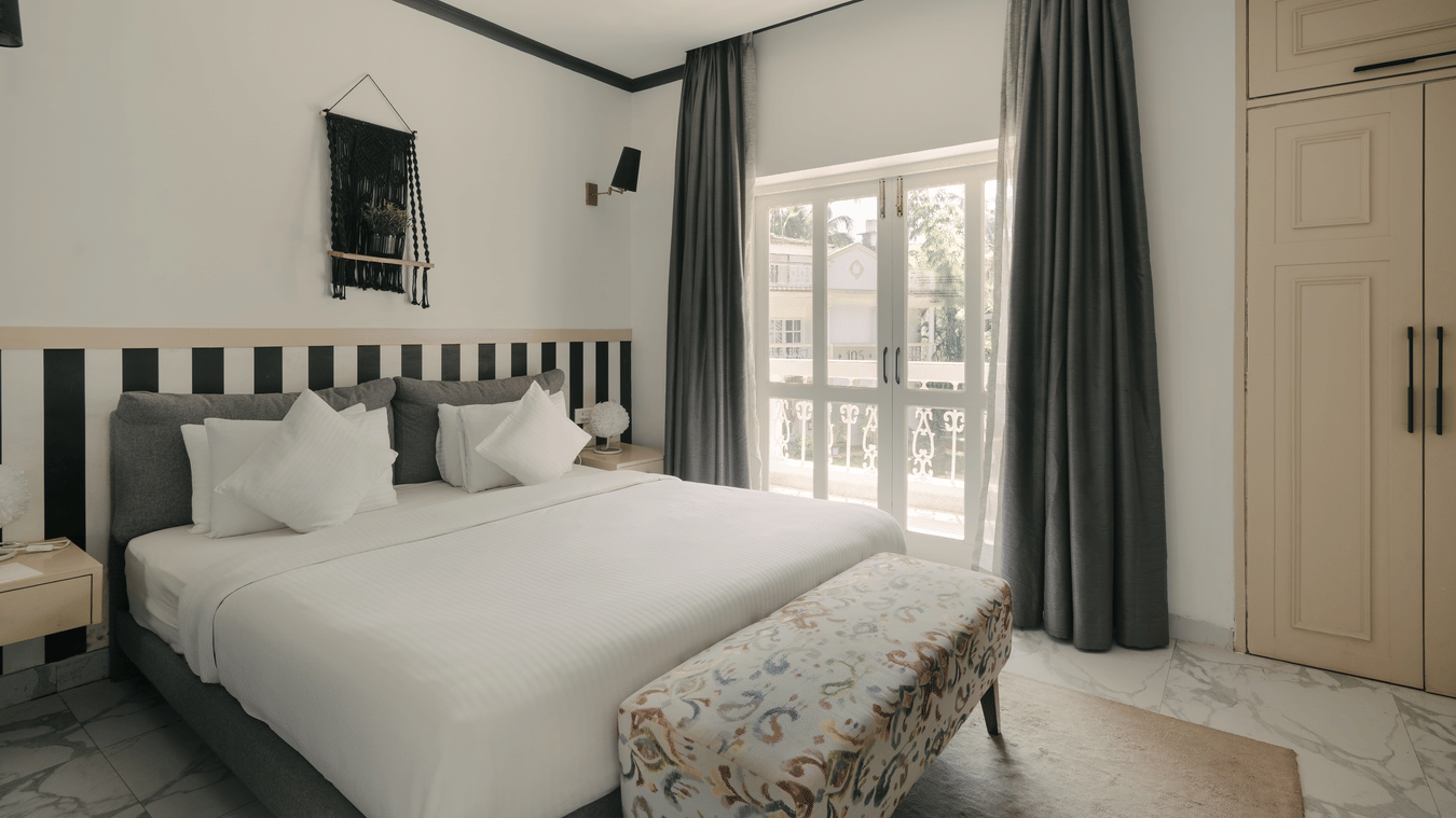 Spacious and elegantly designed bedroom at Richmonde Ananta Elite's Three BHK Premium Villa in Goa.
