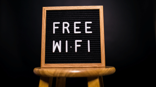 A sign with 'FREE WI-FI' is displayed on a stand.