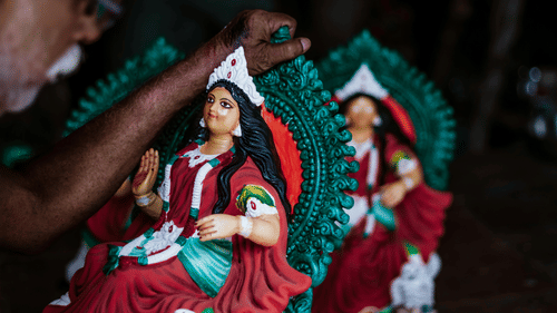 Lakshmi Ji idol being painted