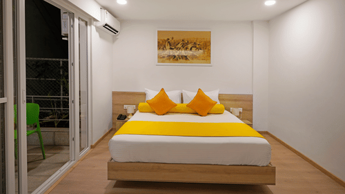 Front view of the Studio Premium Room with a cosy bed at Nest by Rivido Apart Hotel, Bannerghatta Road