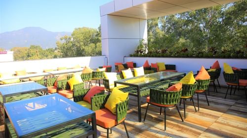 Comfotable chairs at roof top restaurant