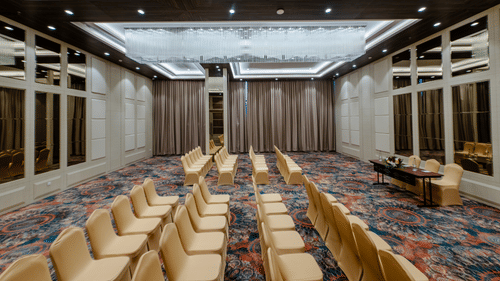 A theatre style arrangement in a banquet hall in Ajmer with carpeted floors - Sarovar Portico, Ajmer
