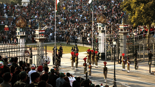 A patriotic crowd witnessing the ceremonial flag-lowering event at the Wagah Border